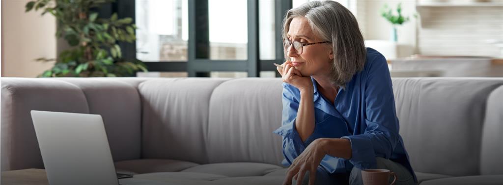 Two older adult couples , looking happy with a palm tree in the background